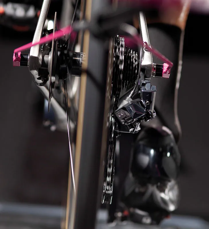Detail of OREKA indoor cycling trainer and bicycle